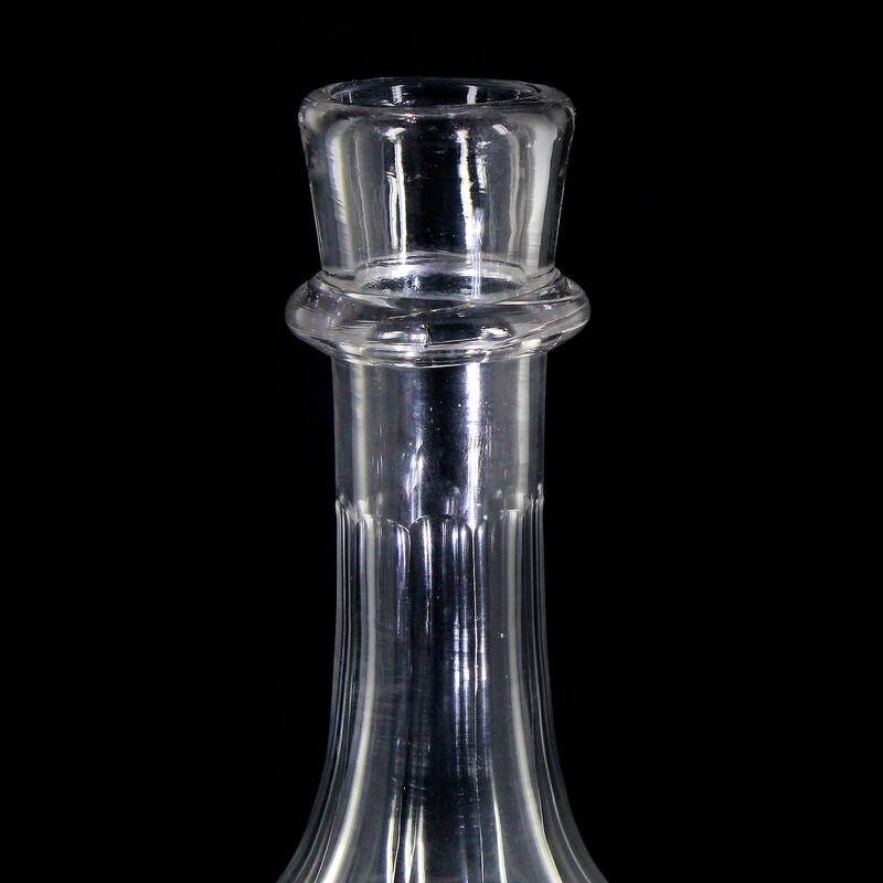 Gr. Bottle made of colorless glass with arched facets, Bavarian Forest around 1870-80.