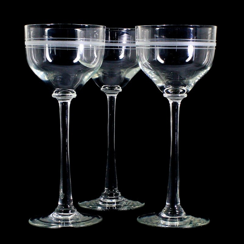 3 stem glasses made of colorless glass with etched decorative band, around 1900-10