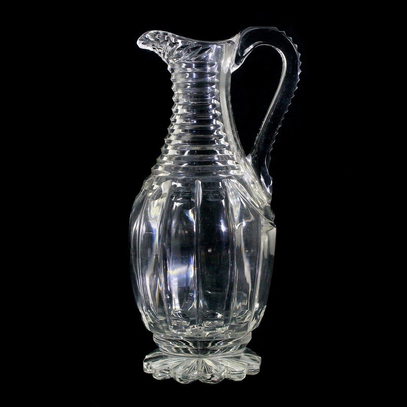 Jug made of colorless glass with olive cut, Russian around 1830.