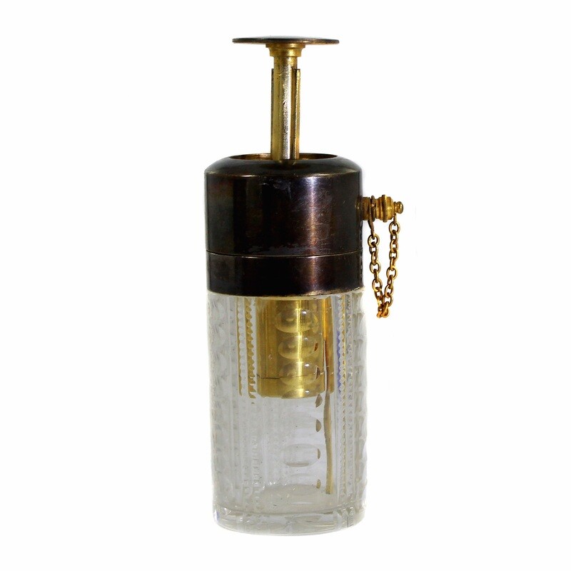 Perfume atomizer made of colorless glass with wedge and olive cut, Bohemia around 1900