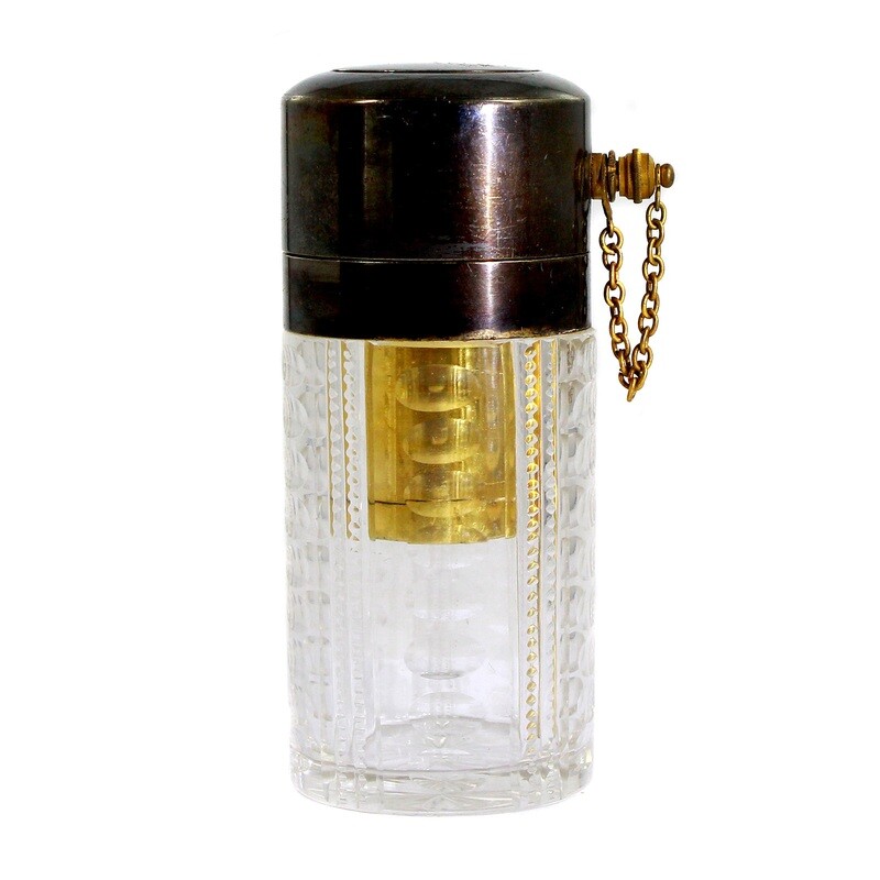 Perfume atomizer made of colorless glass with wedge and olive cut, Bohemia around 1900
