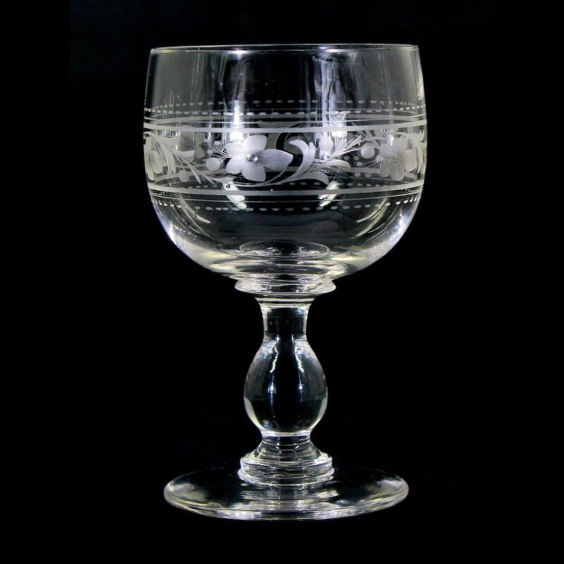 4 wine glasses made of colorless crystal glass with decorative cut decoration, around 1900.