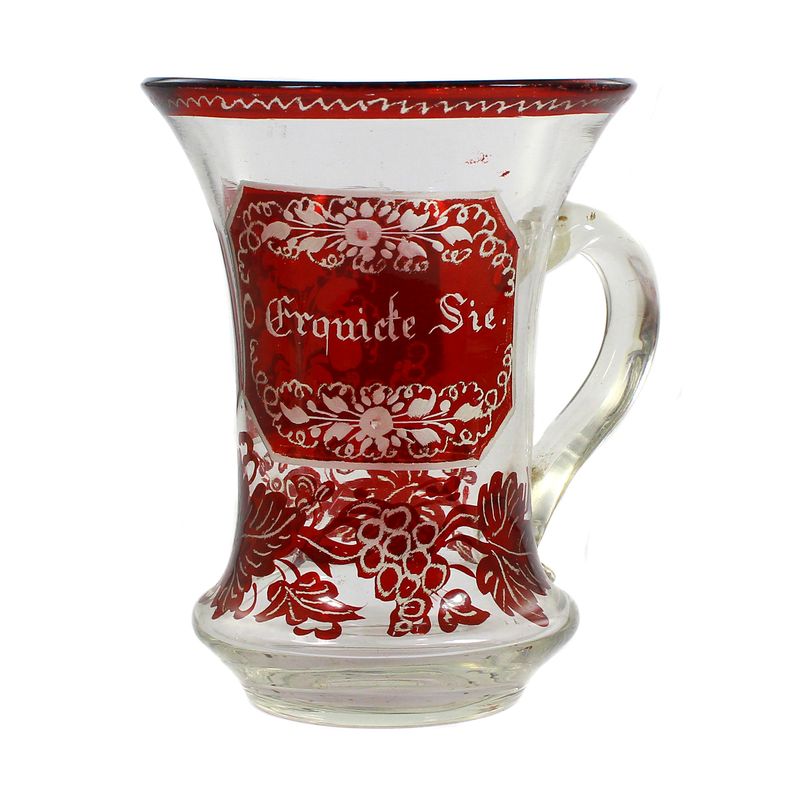 Ruby red glazed mug with vine leaf decoration, Bohemia, 2nd half of the 19th century.