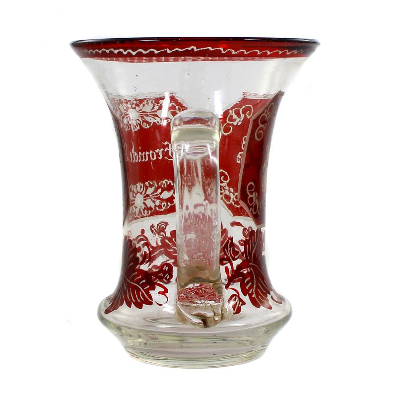 Ruby red glazed mug with vine leaf decoration, Bohemia, 2nd half of the 19th century.
