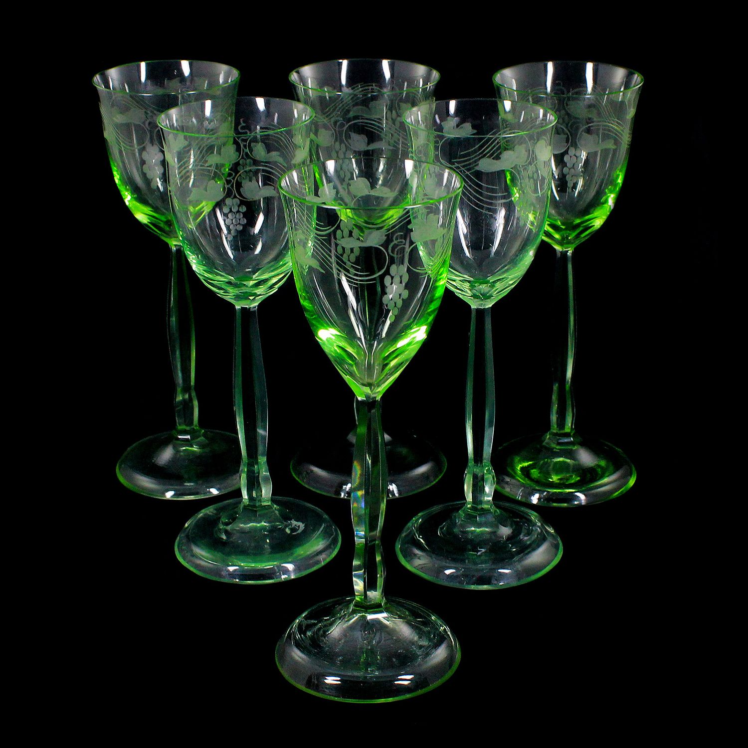 1st of 6. Stem glasses made of uranium-colored glass, designed by Bruno Mauder, Regenhütte