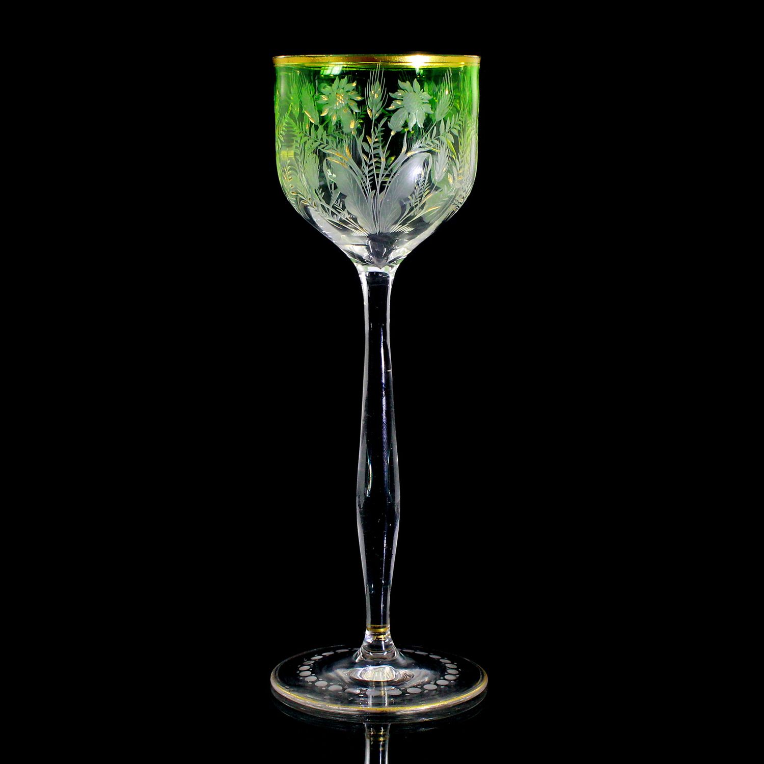 Stem glass with engraved flower decoration, bowl light green, Moser around 1900