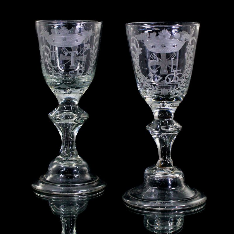 2 goblets with bell base, engraved crown and monogram, dated 1759 &amp; 1766
