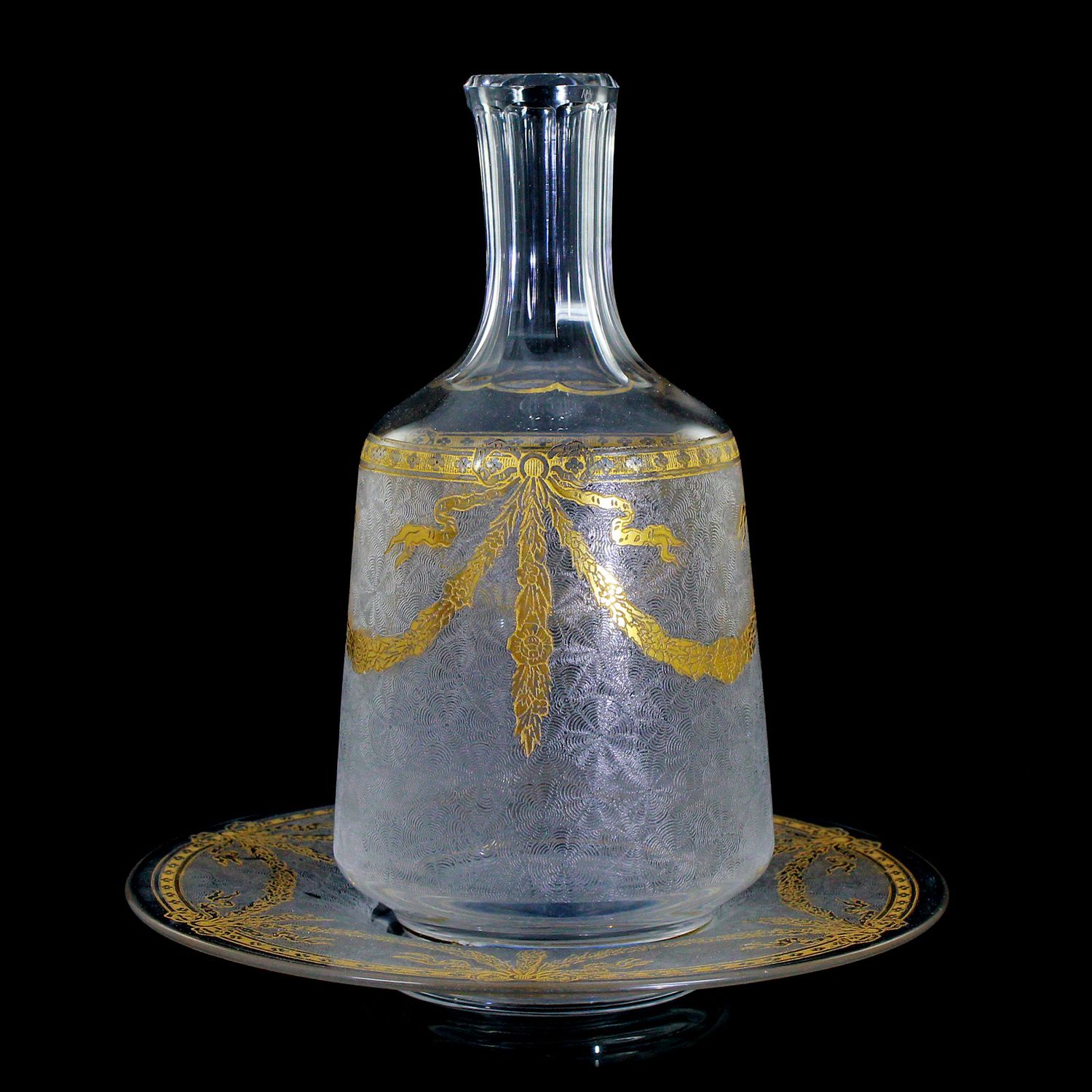 Bottle with presentoir made of colorless crystal glass and etched decoration, Saint Louis
