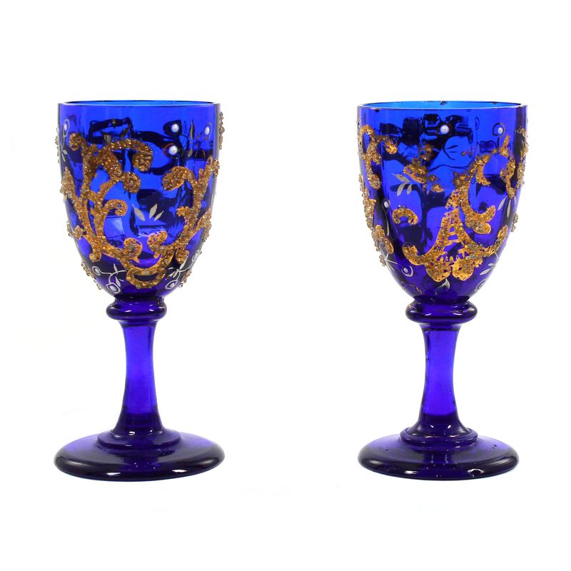 Pair of stemmed glasses made of cobalt blue glass with silver and gold painting, Russia