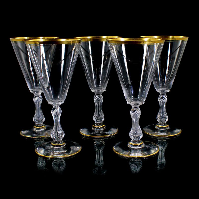 5 large Burgundy glasses made of colorless crystal glass with gold rim, Saint Louis around 1900