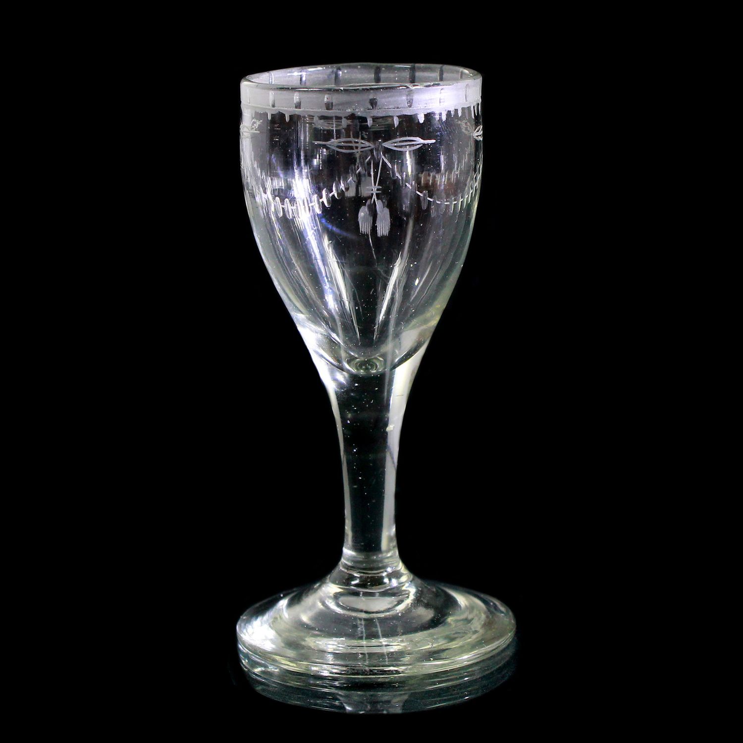 Shot glass made of colorless glass, North German, 1st half of the 19th century.