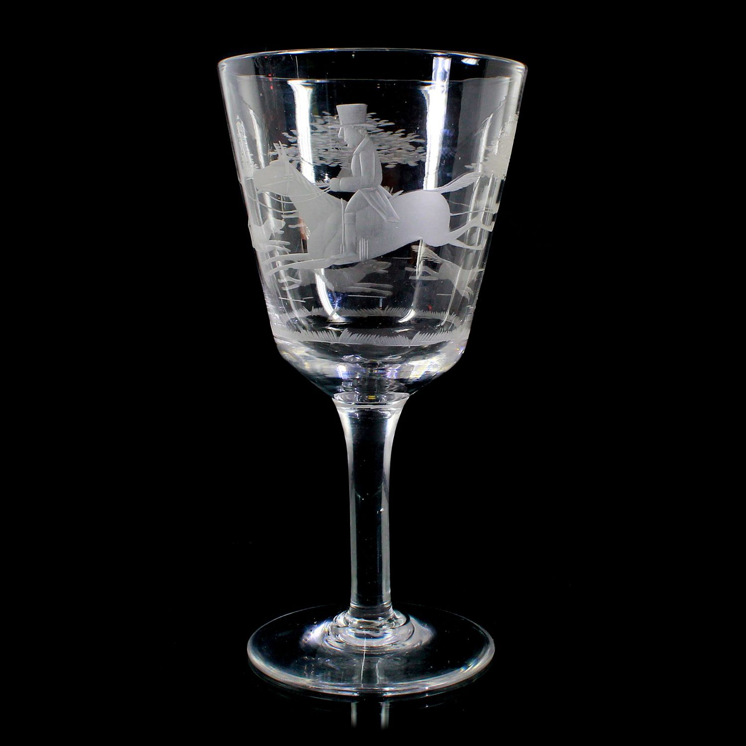 Large wine glass with engraved fox hunt and rider, England, late 18th century.