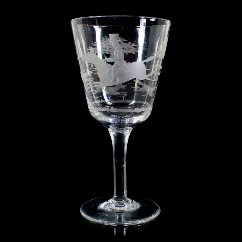 Large wine glass with engraved fox hunt and rider, England, late 18th century.