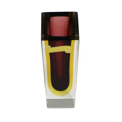 Blockvase aus farblosem Glas mit violetten Innenfang und gelben Zwischenfang.