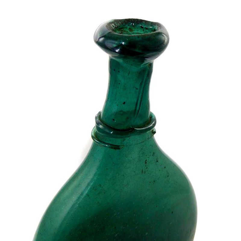 Bocksbeutel, flat bottle made of green glass, Persia 19th century.