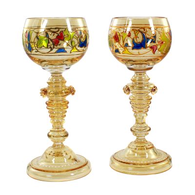 Pair of wine goblets with translucent enamel and gold relief, signed by Fritz Heckert