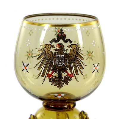 Wine goblet made of topaz-colored glass with imperial eagle, Josephinenhütte around 1900