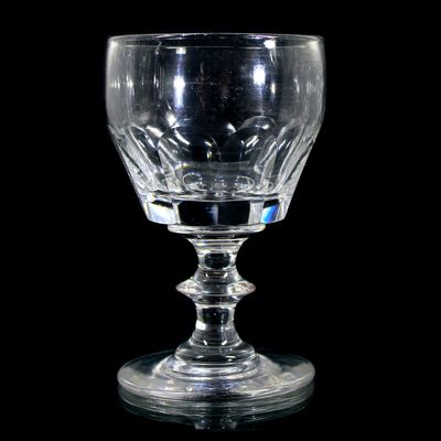 3 goblets made of colorless glass with curved facets and a pressed nodule, mid-19th century.