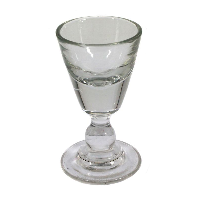 Massive shot glass, so-called "cheater" made of colorless glass, second half of the 19th century.