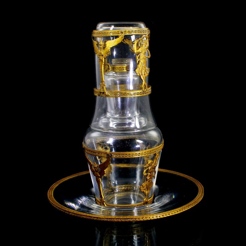 Decanter with stopper, mug, plate with brass fittings, probably France around 1870
