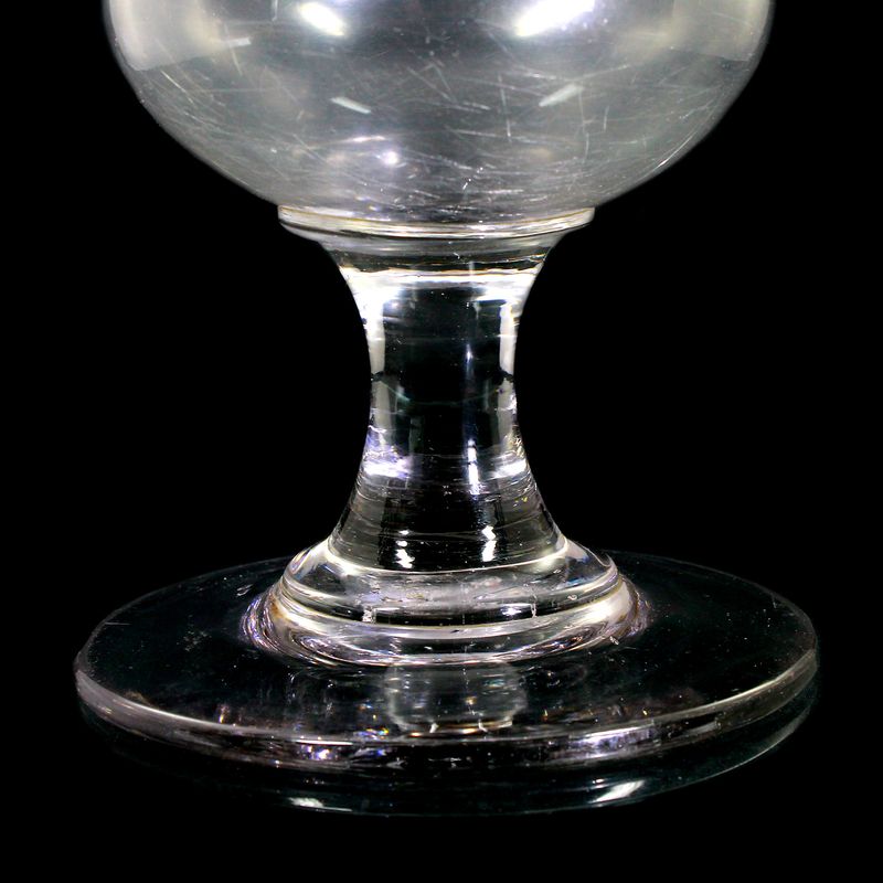 Large crater vase made of slightly greyish glass with a pontil mark, mid-19th century.