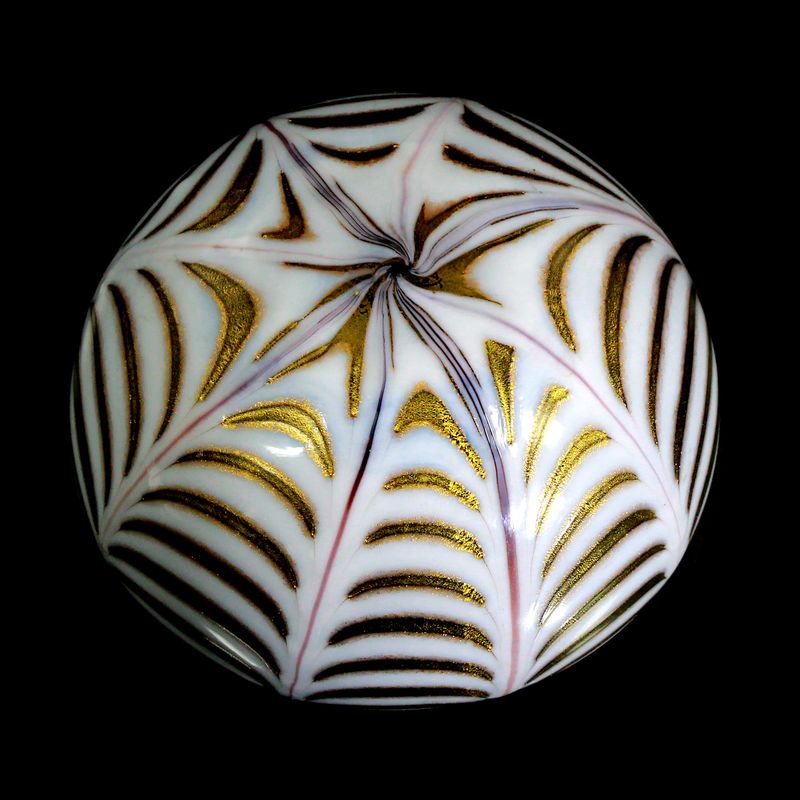 Paperweight with Fenicio decoration made of black glass with tin enamel overlay, Murano