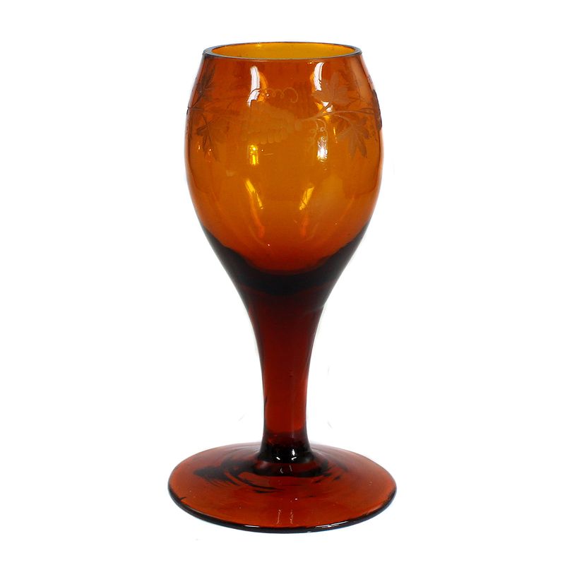 Amber-colored goblet with cut decoration, early 19th century. ​