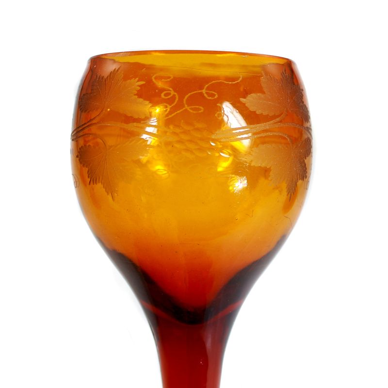Pair of amber-colored goblet glasses with cut decoration, early 19th century.