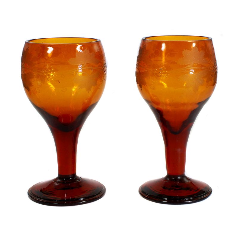 Pair of amber-colored goblet glasses with cut decoration, early 19th century.