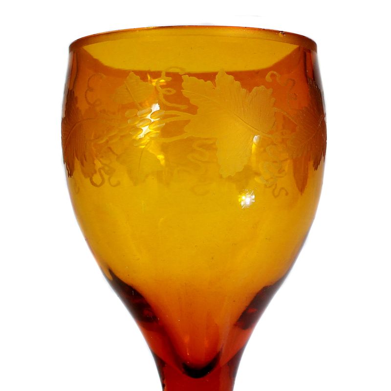 Amber-colored goblet with cut decoration, early 19th century. ​