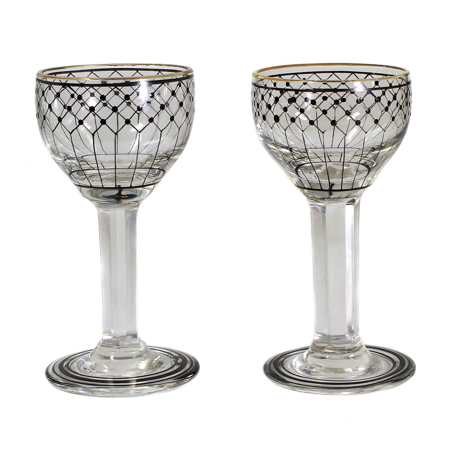 Pair of small stemmed crystal glasses with decoration in elegant black, Steinschönau.