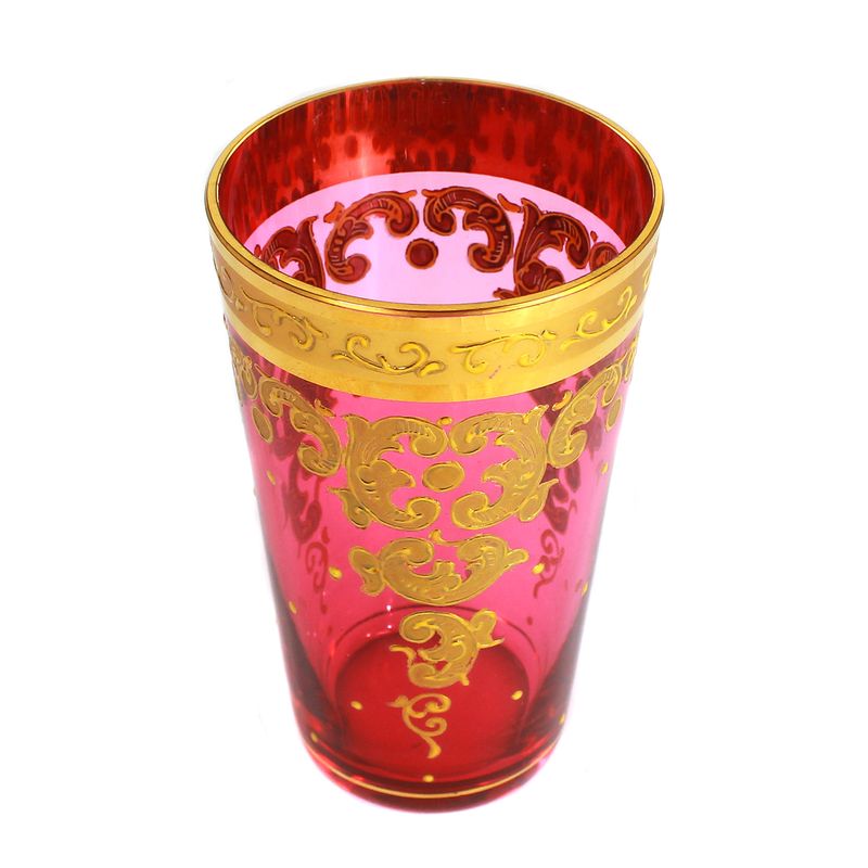 1 of 6 champagne glasses with rose-colored base and gold painting, probably Moser in Carlsbad