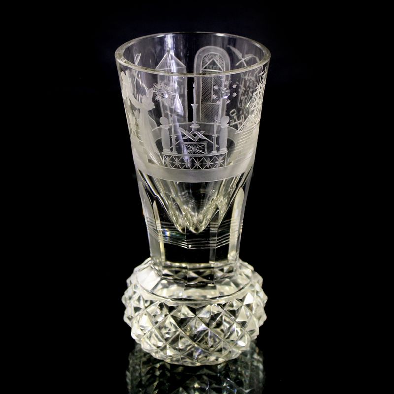Tall Masonic glass with pineapple-cut studs and Masonic symbols, circa 1900–10.