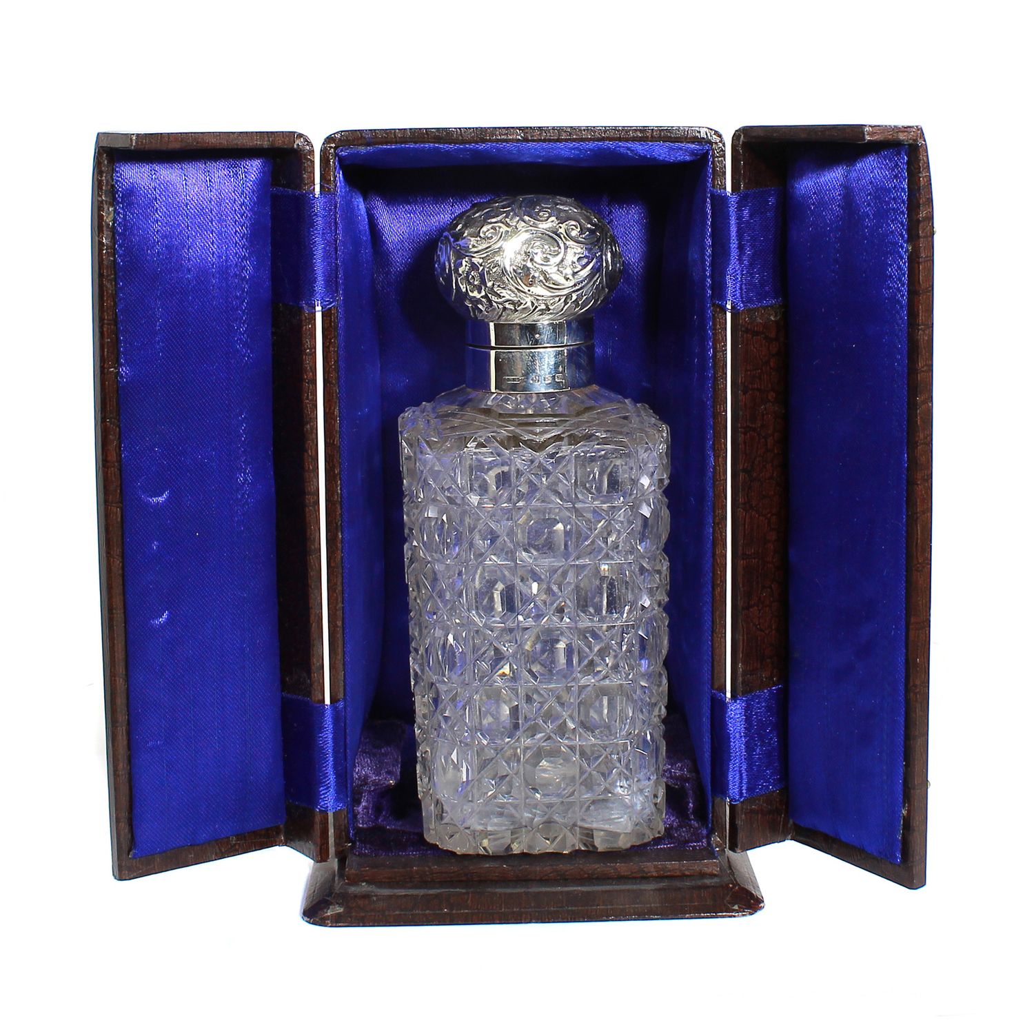 Perfume bottle with silver mount, in a presentation case by Britton, Gould &amp; Co., circa 1922