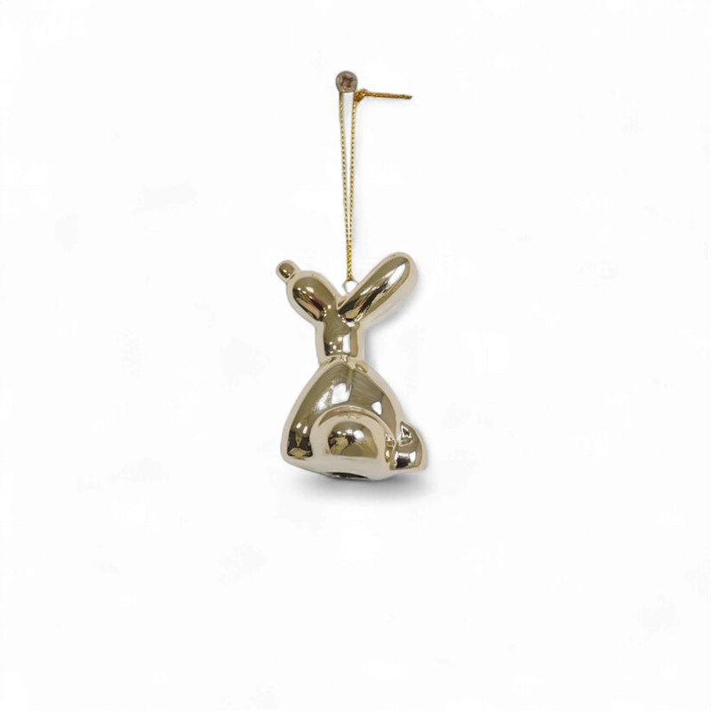 Hond hangend zittend  goud