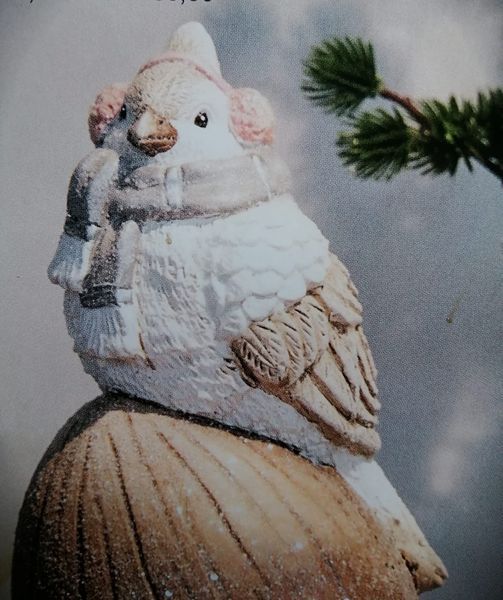 Figur. Vinterfugle på agern m. ørevarmer
