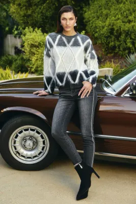 SWEATERS