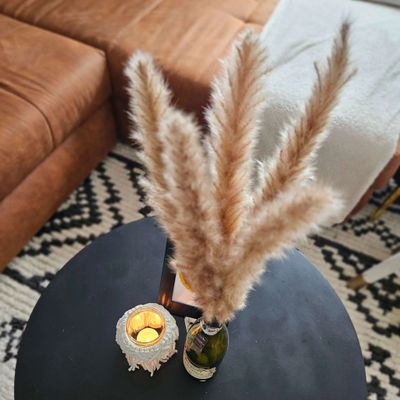 Makramee Windlicht mit Teelicht – handgemachte Boho Deko im MUCA Café, Berneck, kreative DIY Atmosphäre.