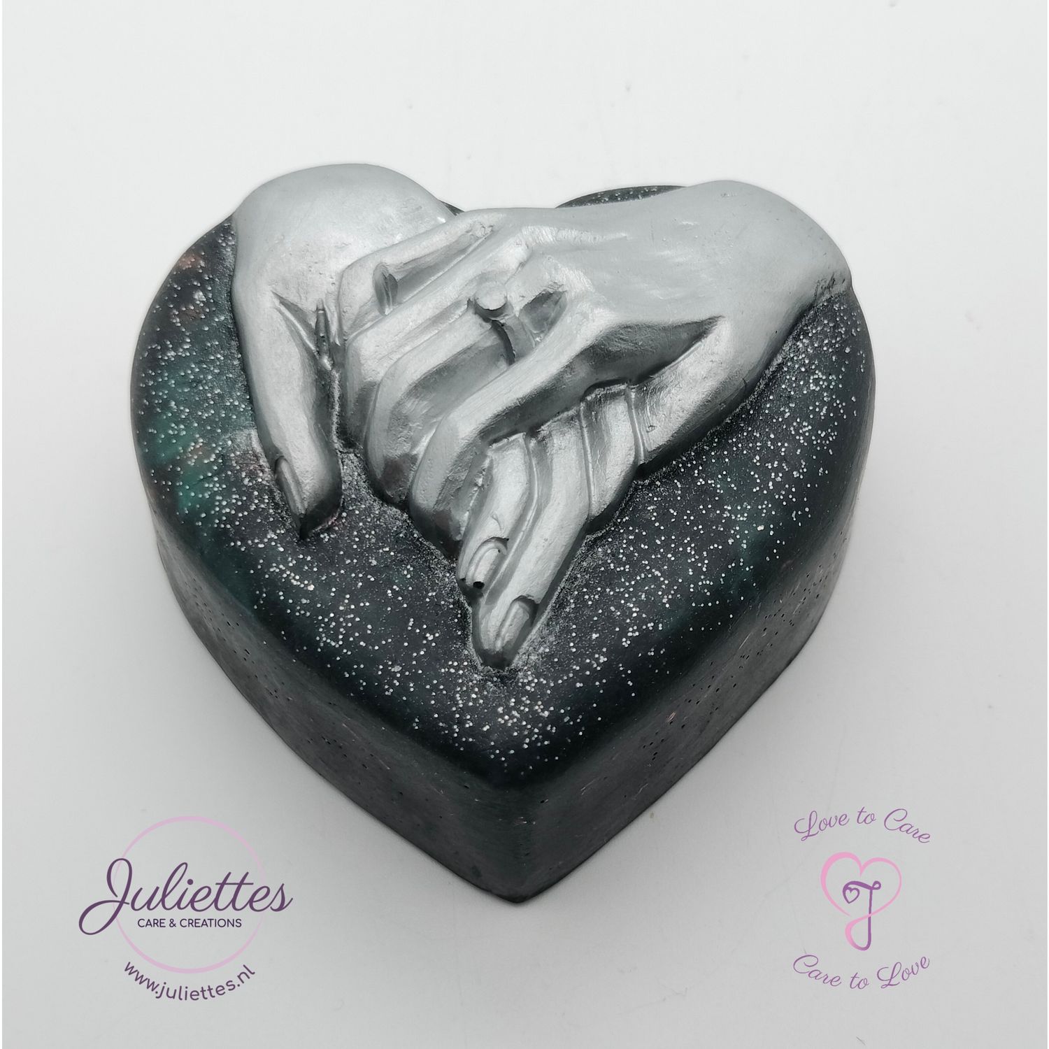 Orgonite Hand in hand in liefde (zwart zilver) Orgonite Hand in hand in liefde (zwart zilver)