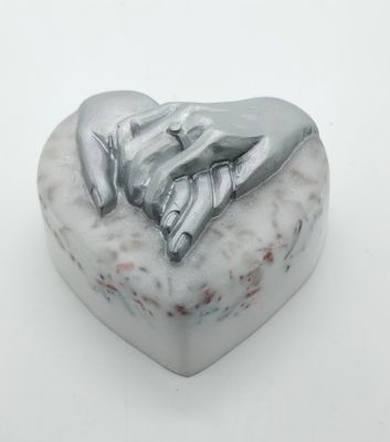 Orgonite Hand in hand in liefde (wit zilver) Orgonite Hand in hand in liefde (wit zilver)