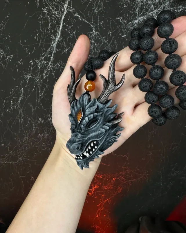 Gray dragon mask necklace