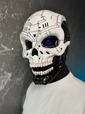 White and black cyberpunk skull mask with microcircuits design, moving jaw and blue LED lights in the eyes