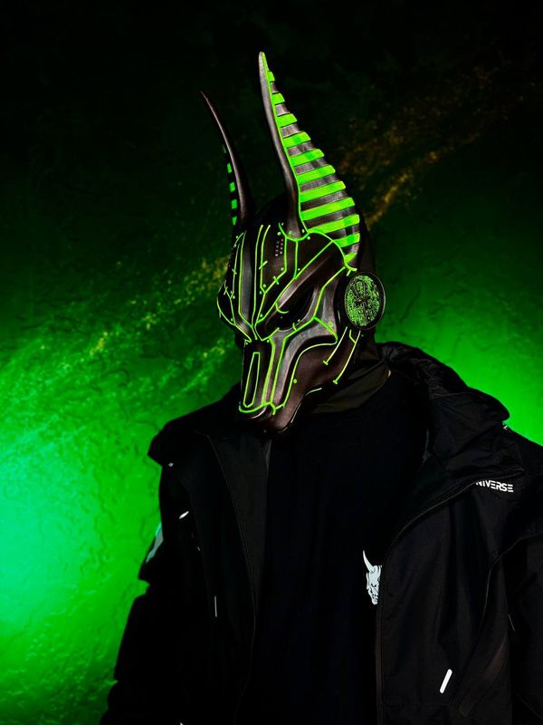 Metallic cyberpunk Anubis mask with green UV glow, full face jackal mask with adjustable straps, futuristic cosplay mask
