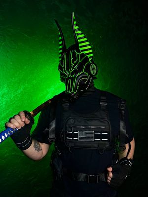 Black cyberpunk Anubis mask with green UV glow, full face jackal mask with adjustable straps, futuristic cosplay mask