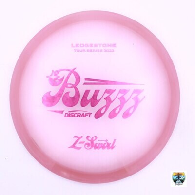 Discraft Z Swirl Buzzz Ledgestone 2022 Tour Series, Manufacturer Weight Range: 177+ Grams, Color: Pink, Serial Number: 0007-0698