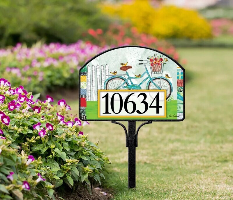 Magnetic yard sign featuring a vintage bicycle with flowers, an American flag, and address numbers in a garden.