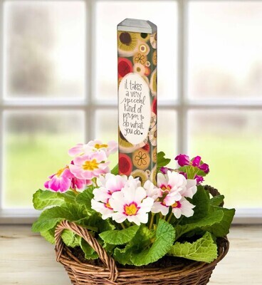 Studio M 13-inch art pole styled in a basket with flowers.