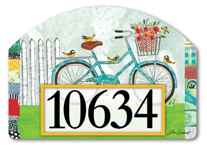 Magnetic yard sign featuring a vintage bicycle with flowers, an American flag, and address numbers in a garden.