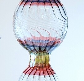 Attract hummingbirds with this stunning 12" borosilicate glass feeder. Durable, easy to clean, and artisan-crafted.