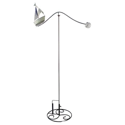 Black metal garden spinner base with a decorative scrolled circular floor stand and a tall, slender vertical pole.